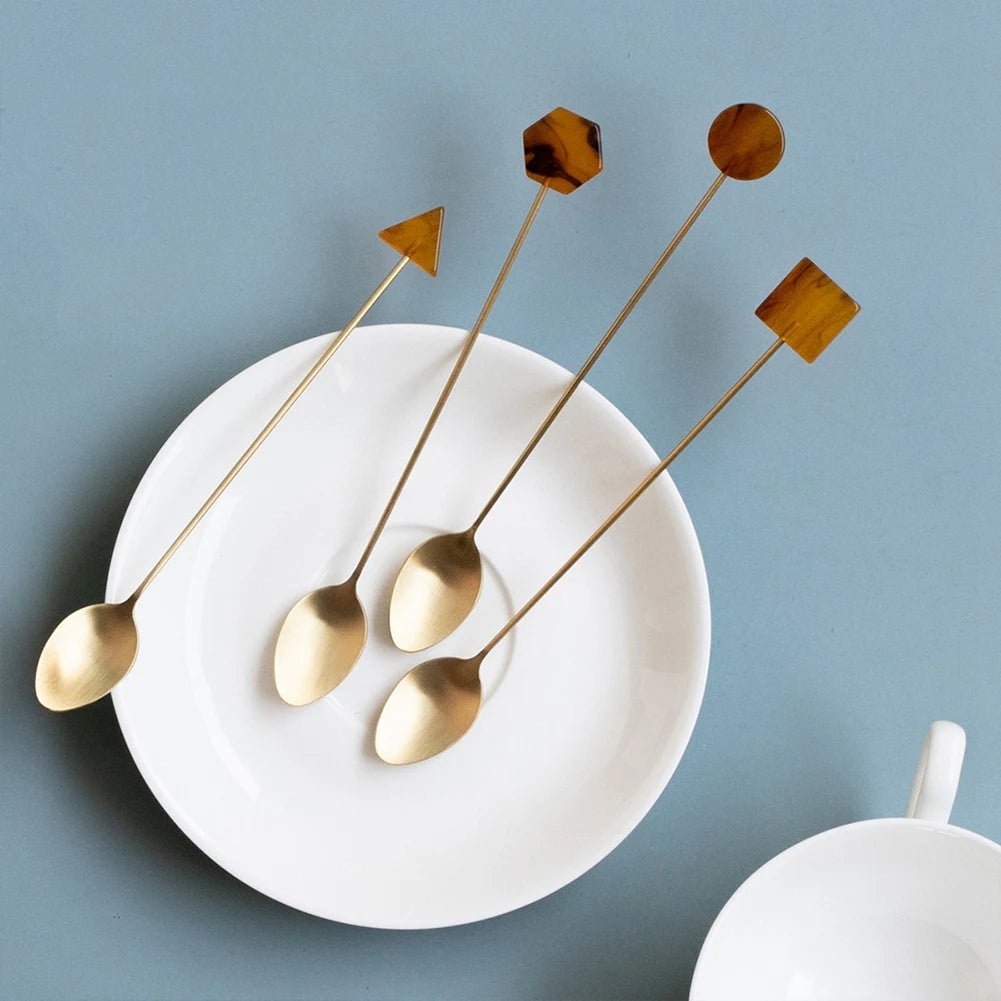 Elegantes 4-teiliges Edelstahl Löffel & Gabel Set mit gold-geometrischen Acrylgriffen