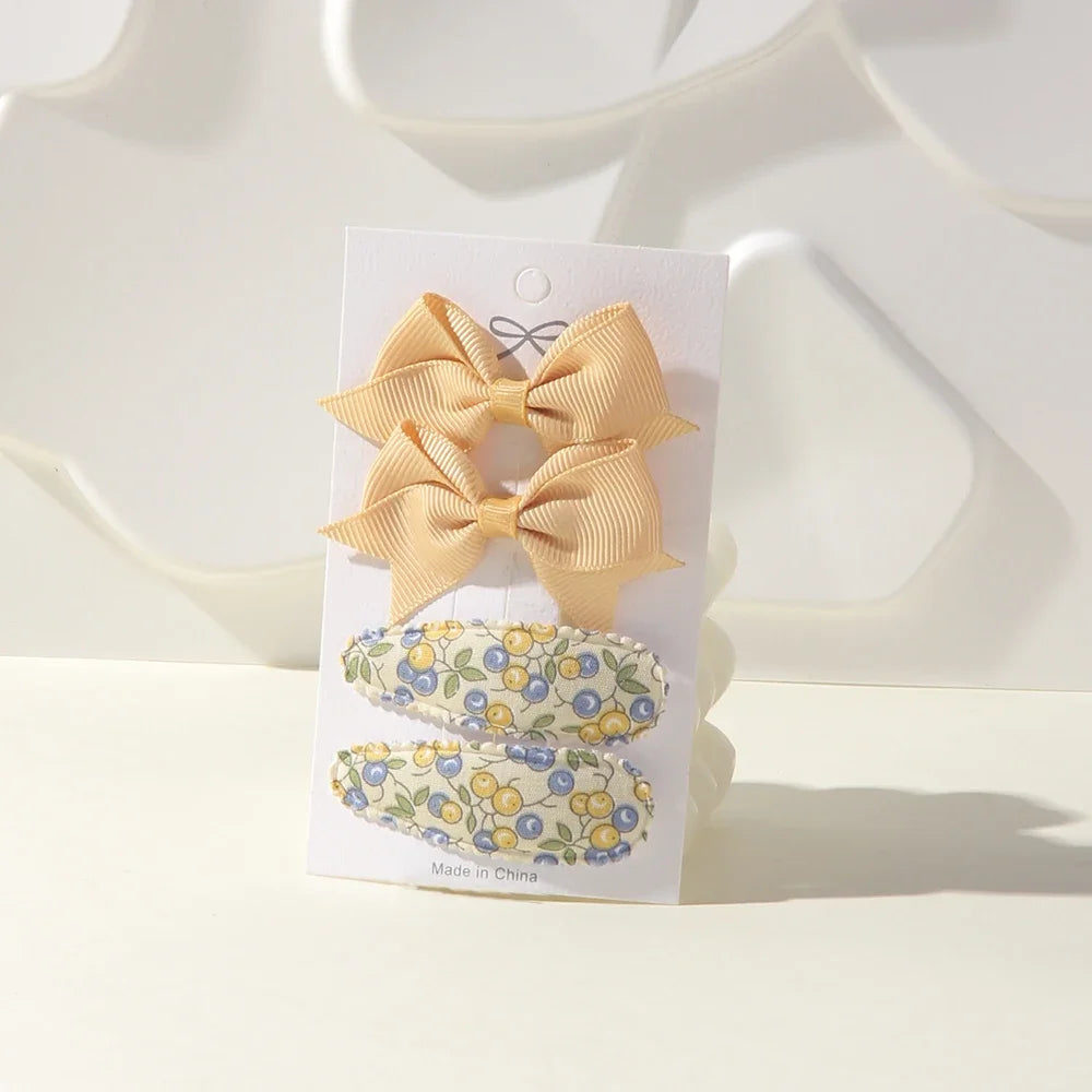 Bunte Haarklammern Set – 4-teilig, sichere Legierung - farbenfrohe Schleifen für Mädchen
