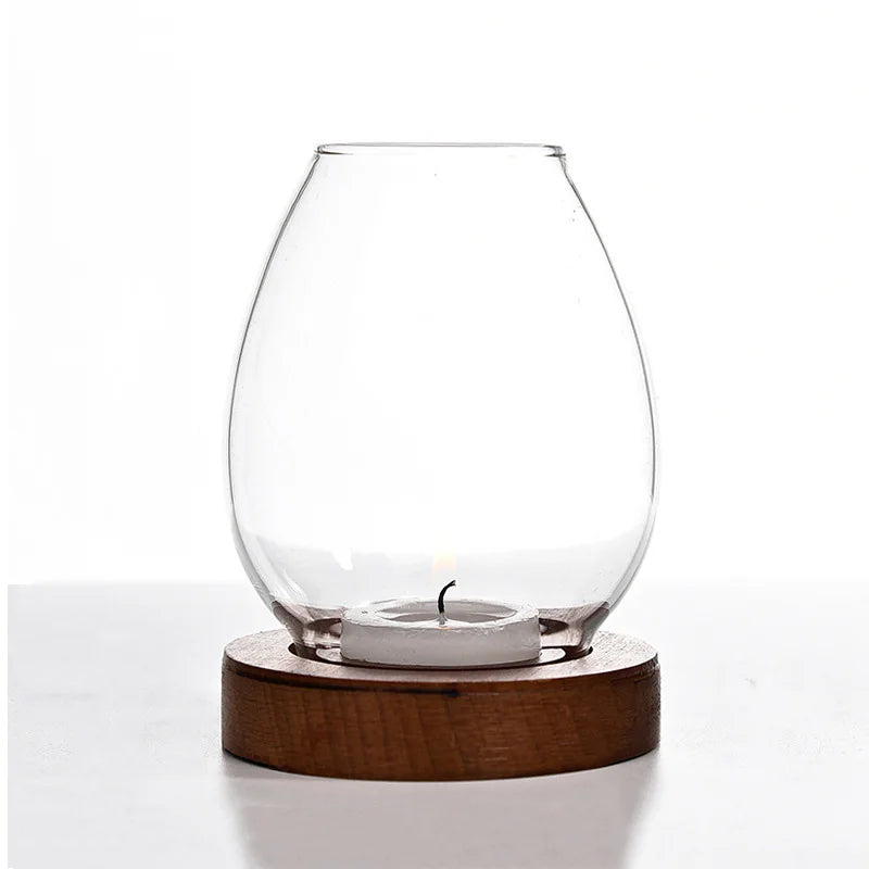 Kerzenhalter aus transparentem Glas als runde Teelichtleuchter