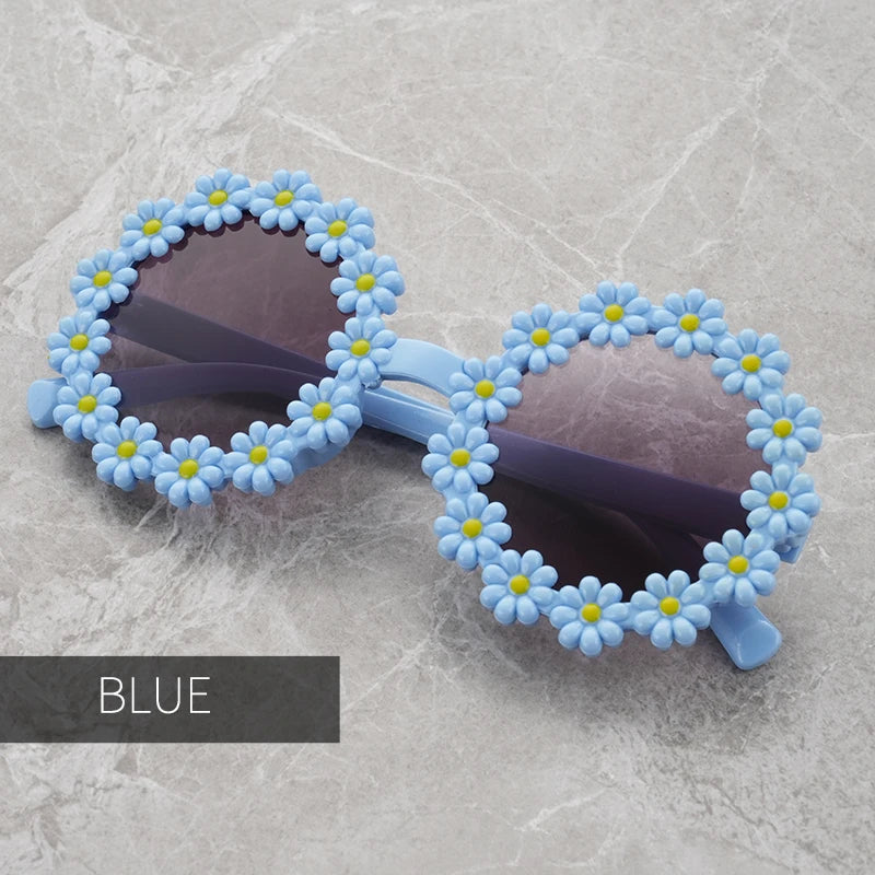 Sonnenschutz trifft Style: Runde Kinder-Sonnenbrille mit blütenblattförmigem Rahmen