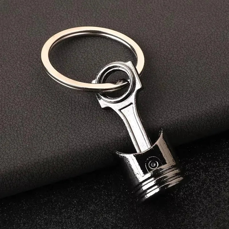 Robuster Edelstahl Schlüsselanhänger im Autoteile-Design – Perfektes Männergeschenk