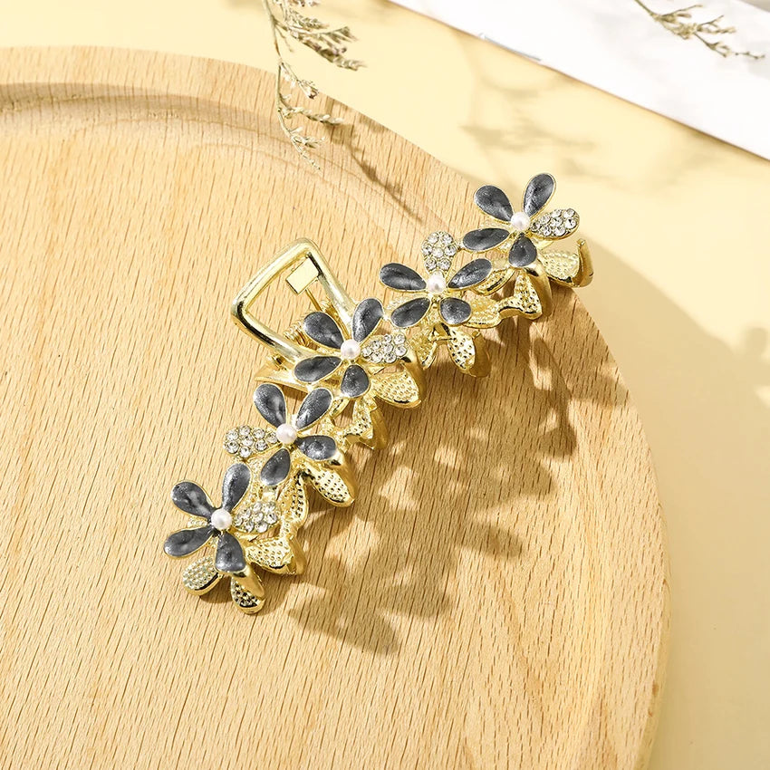 Elegante Strass-Haar Klaue mit floralem Metall-Design – stilvoll - robust