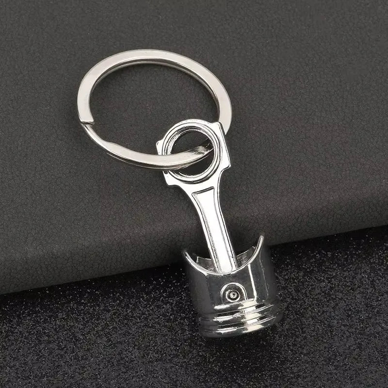 Robuster Edelstahl Schlüsselanhänger im Autoteile-Design – Perfektes Männergeschenk