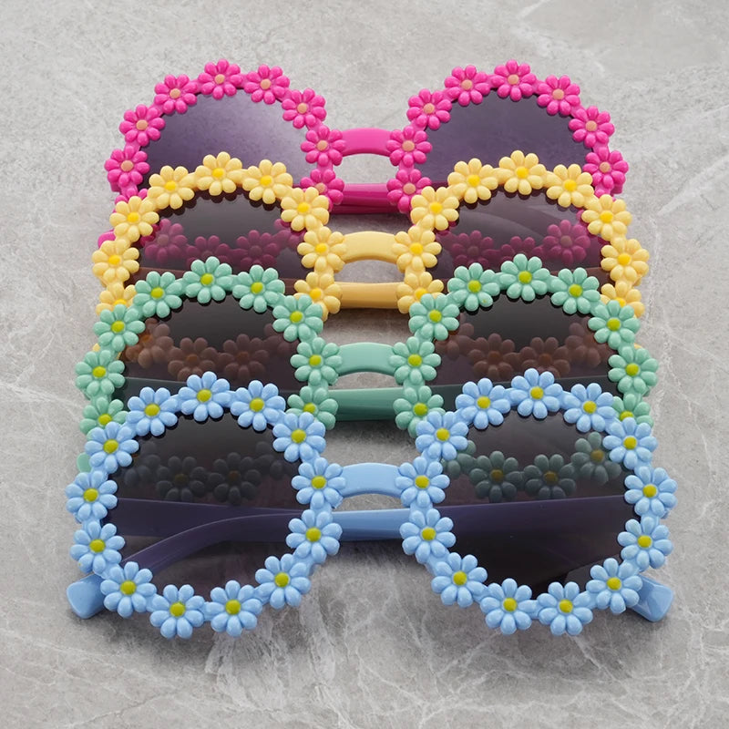Sonnenschutz trifft Style: Runde Kinder-Sonnenbrille mit blütenblattförmigem Rahmen