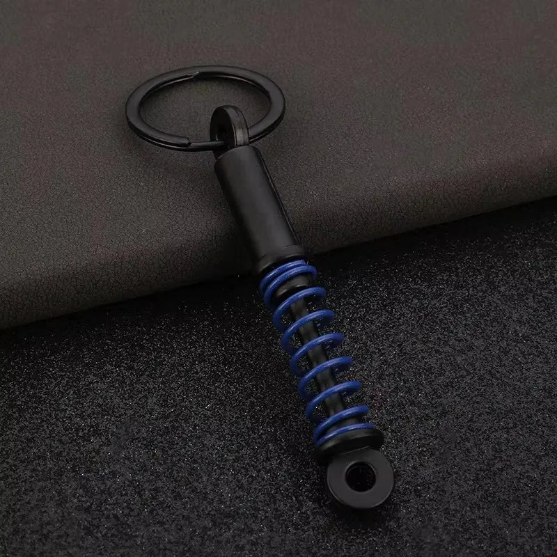 Robuster Edelstahl Schlüsselanhänger im Autoteile-Design – Perfektes Männergeschenk