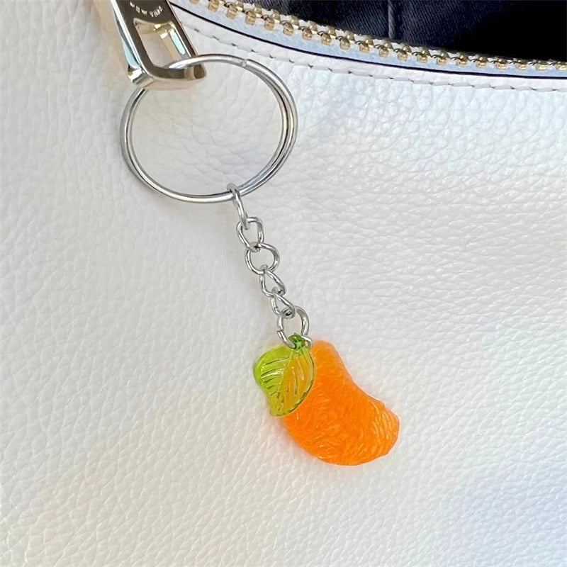 Frischer Hingucker: Kreativer Orangenscheiben Schlüsselanhänger aus Harz - Zink