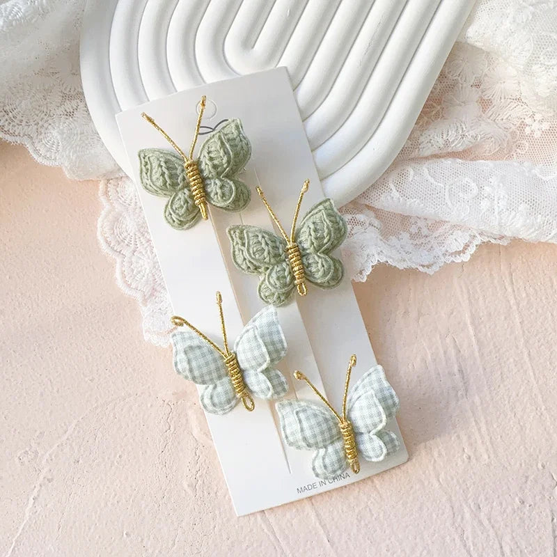 Handgefertigte Baby Haarspangen Set aus Wolle mit Schmetterlingsdesign