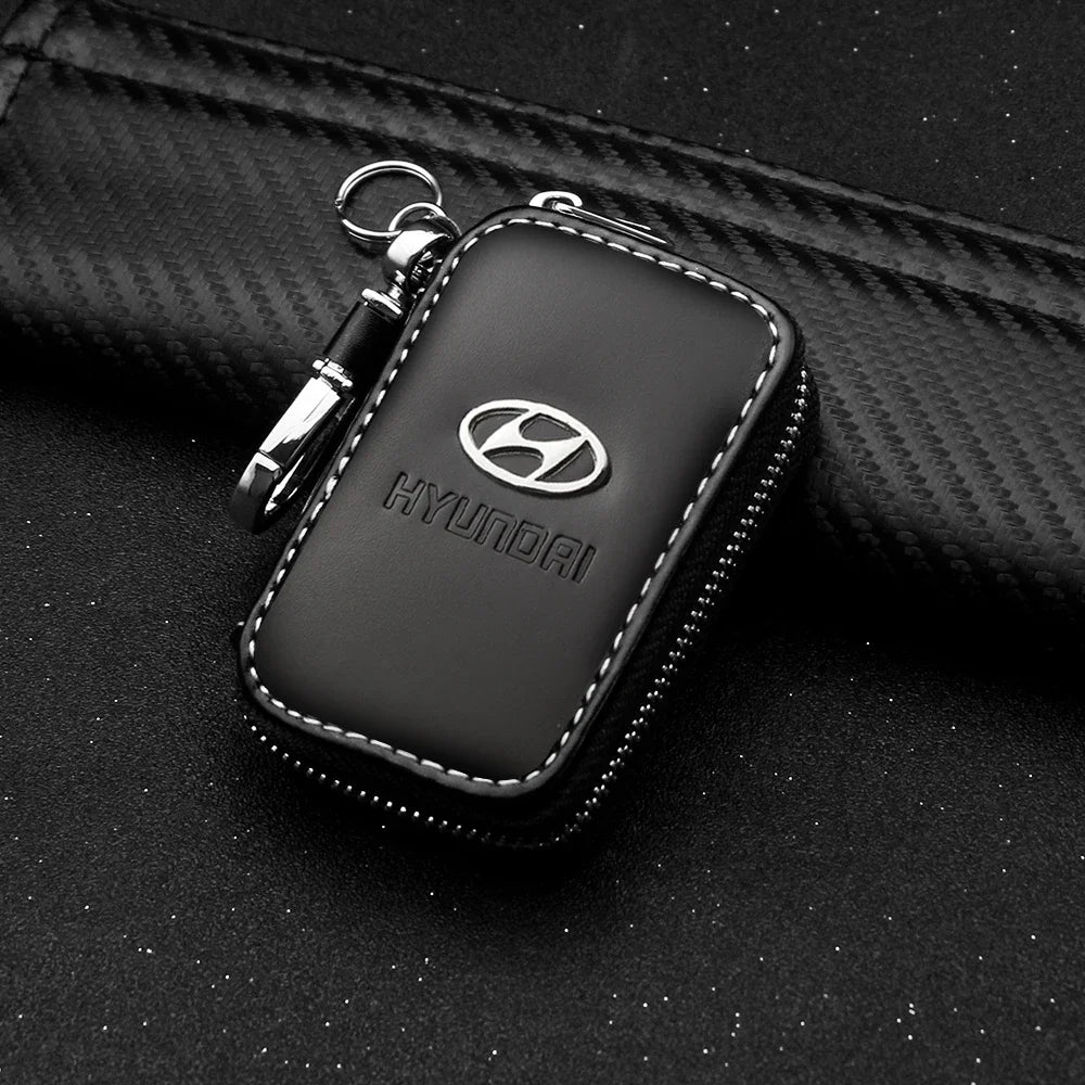 Robuster Metall-Leder Schlüsselanhänger mit Hyundai Emblem – Stilvoll - Praktisch