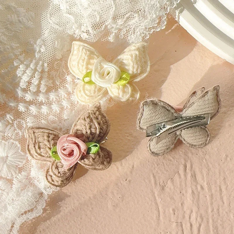Handgefertigte Baby Haarspangen Set aus Wolle mit Schmetterlingsdesign