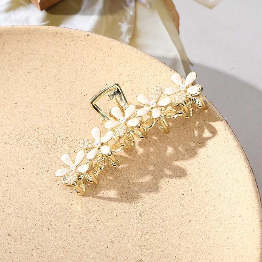 Elegante Strass-Haar Klaue mit floralem Metall-Design – stilvoll - robust