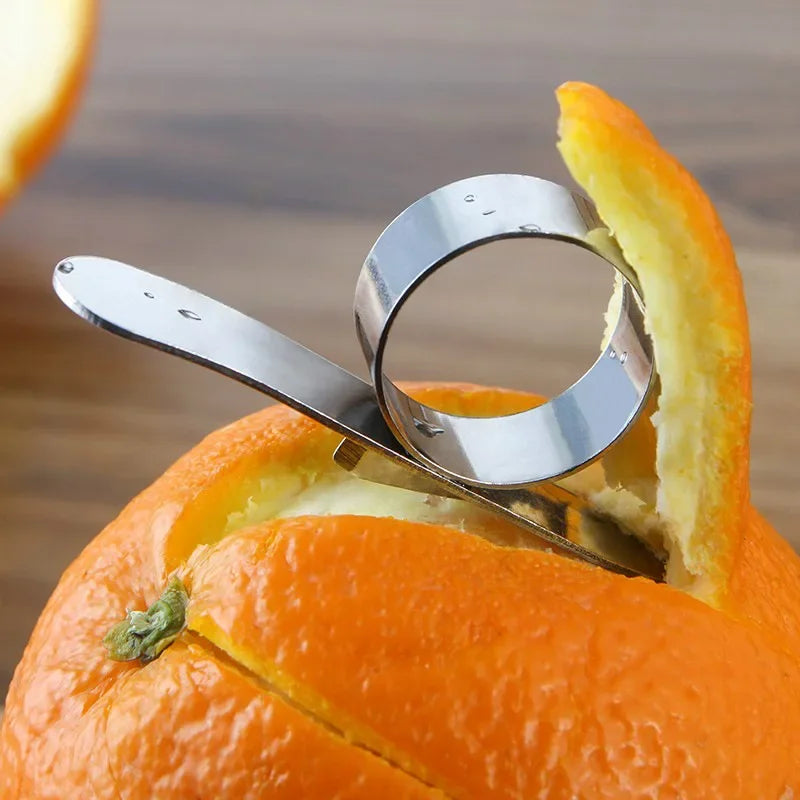 Sicher - Effizient: Edelstahl-Orangenschäler für müheloses Schälen und Schutz