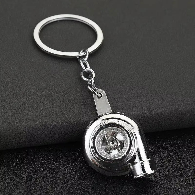 Robuster Edelstahl Schlüsselanhänger im Autoteile-Design – Perfektes Männergeschenk
