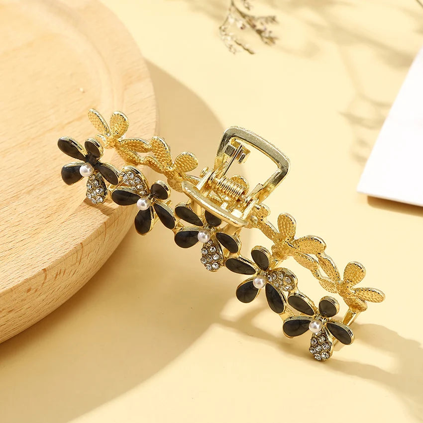 Elegante Strass-Haar Klaue mit floralem Metall-Design – stilvoll - robust