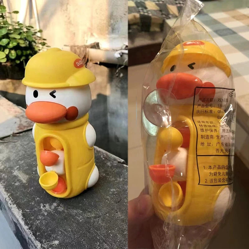 Interaktives Baby Badespielzeug mit Saugnapf - Wasserrad, Ente/Elefant