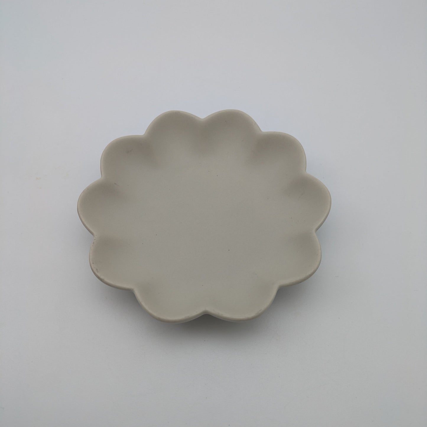 Untersetzer Blüte beige Hochwertiges Teegeschirr für stilvolles Ambiente