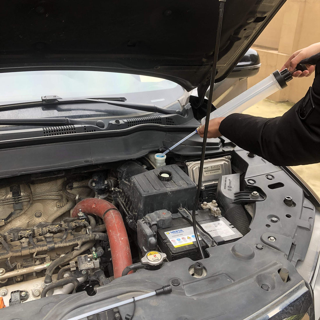 Effizientes Fluessigkeitsmanagement in der Fahrzeugpflege Warum eine gute Umfuellpumpe unerlaesslich ist