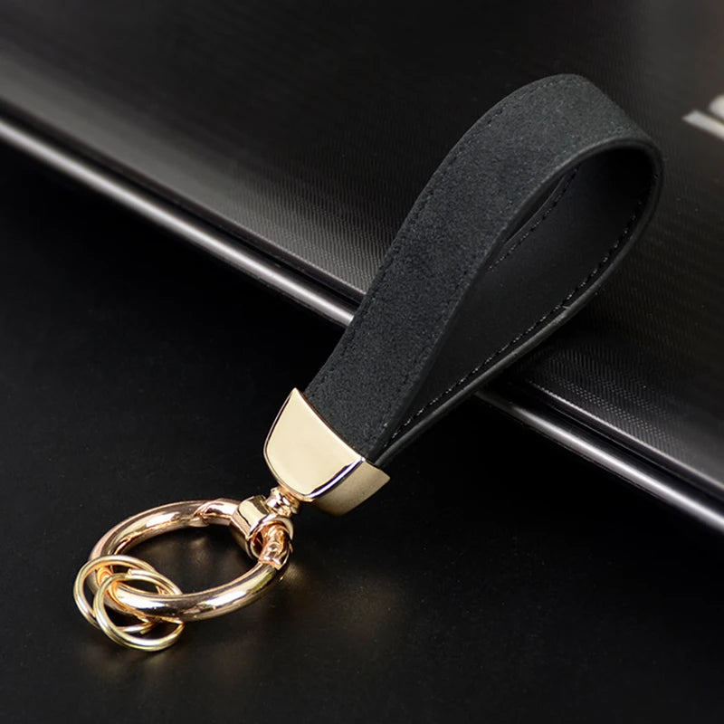 Wildleder Auto Schlüsselanhänger mit O-Schließe schwarz silber unisex