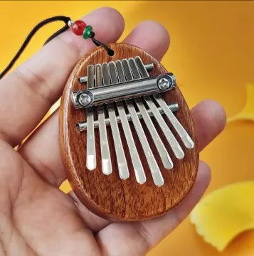 Tragbares Mini Daumenklavier aus Holz – 8 Töne, ideal für Anfänger - Reise