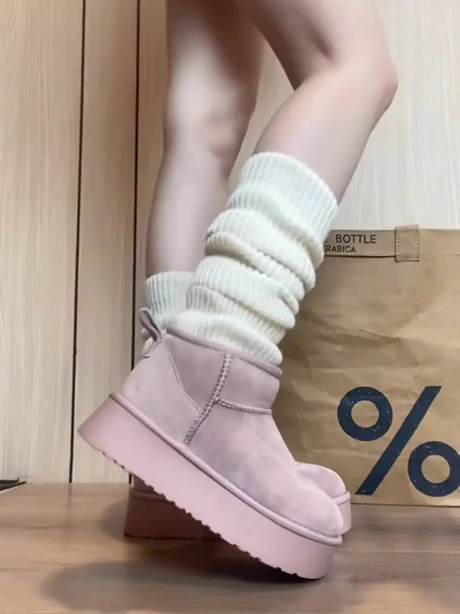 Warme gestrickte Beinwärmer und lange Beinsocken für Damen