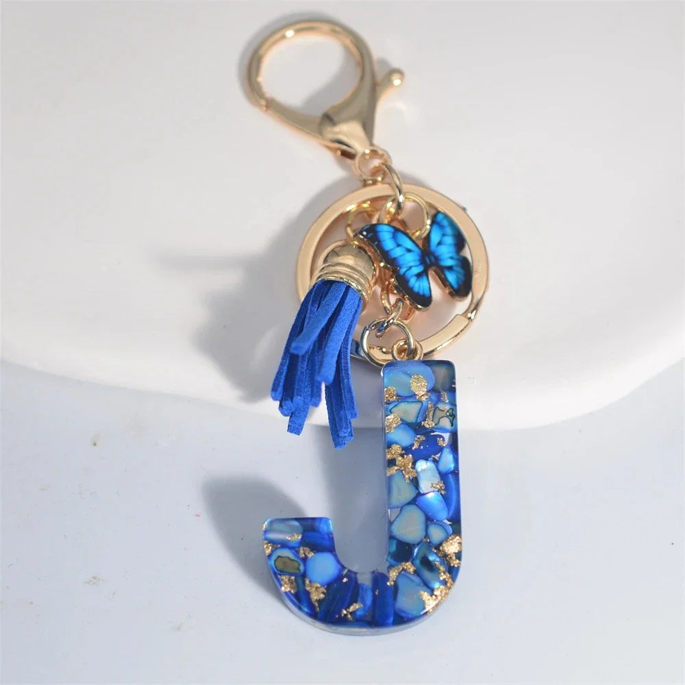 Blauer Buchstaben Schlüsselanhänger mit Quaste und Schmetterling 26 Initialen
