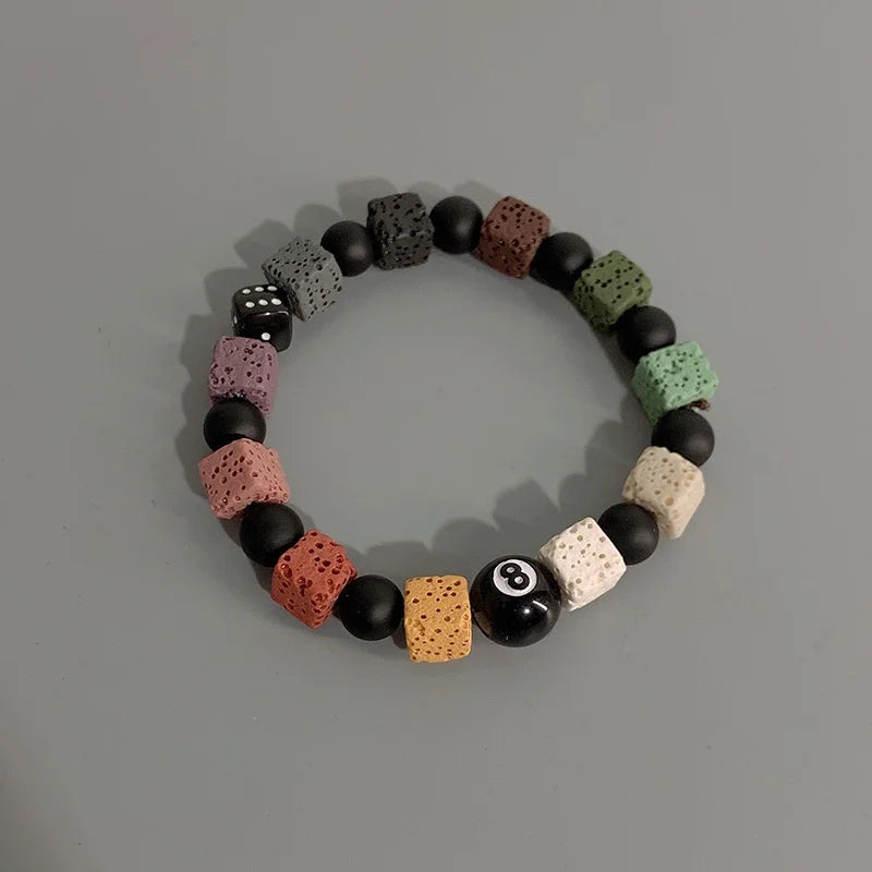 Elastisches Unisex Armband mit schwarzen Perlen Kugeln und Einstellbar