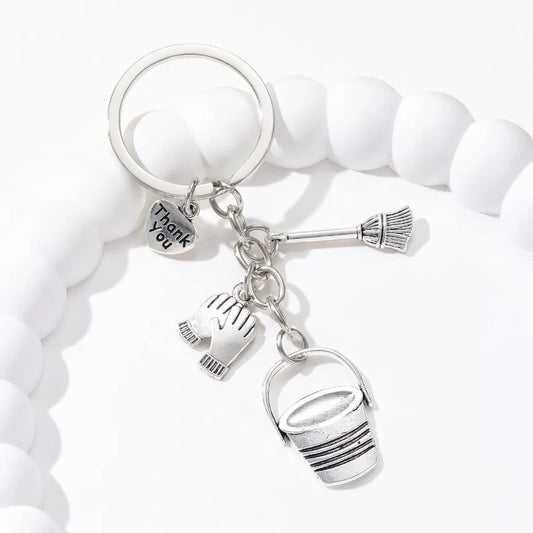 Robuster Schlüsselanhänger Reinigungsthema – Stilvolles Metall-Design als Geschenk