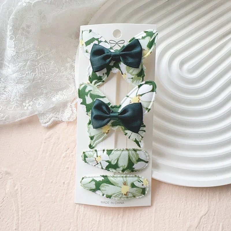 4-teiliges Haarschmuck Set für Mädchen mit Schmetterlingsdesign aus Polyester
