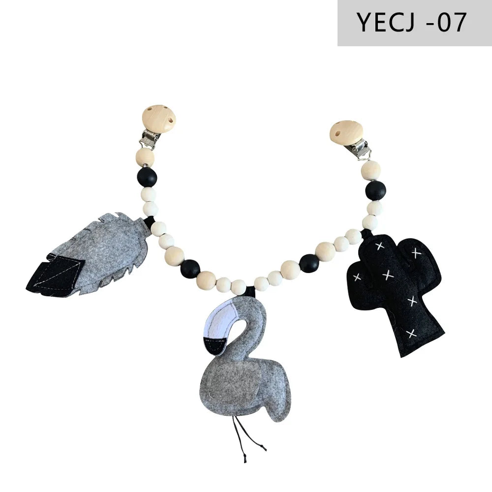 Holz-Kinderwagenclip mit Beißring und Rassel für Babys