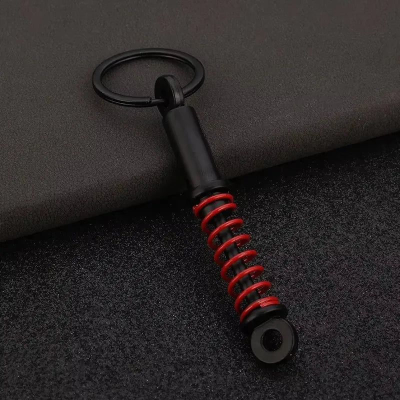 Robuster Edelstahl Schlüsselanhänger im Autoteile-Design – Perfektes Männergeschenk