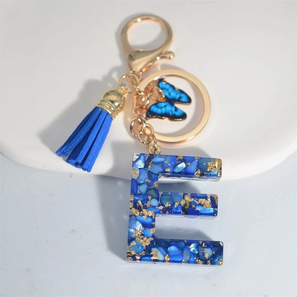 Blauer Buchstaben Schlüsselanhänger mit Quaste und Schmetterling 26 Initialen