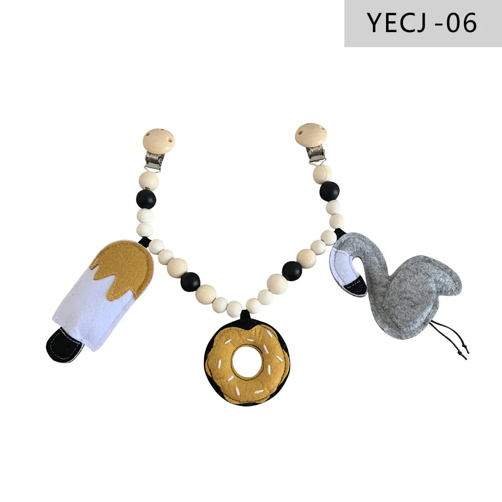 Holz-Kinderwagenclip mit Beißring und Rassel für Babys