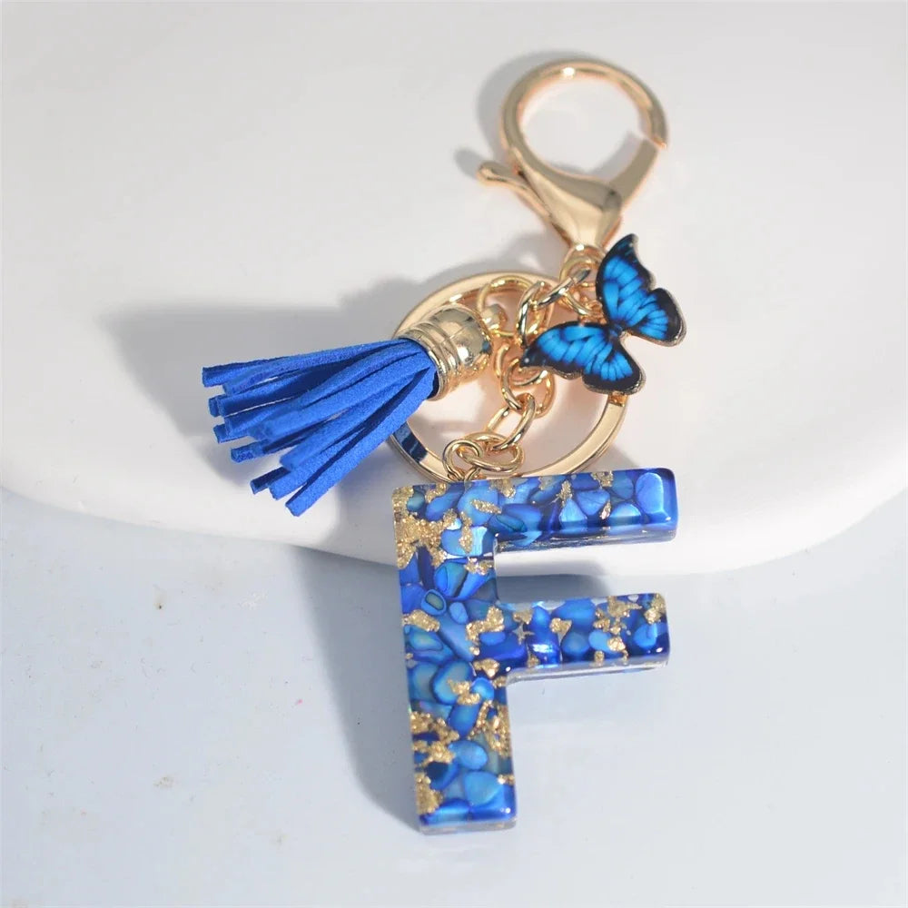 Blauer Buchstaben Schlüsselanhänger mit Quaste und Schmetterling 26 Initialen