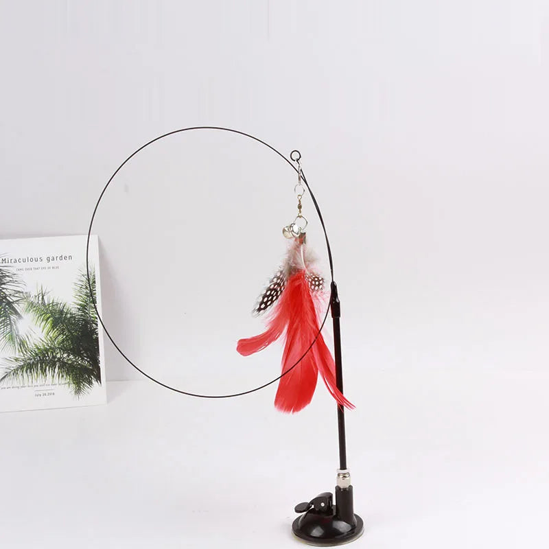 Interaktives Katzenspielzeug mit bunter Feder, Saugnapf und abnehmbarem Stab