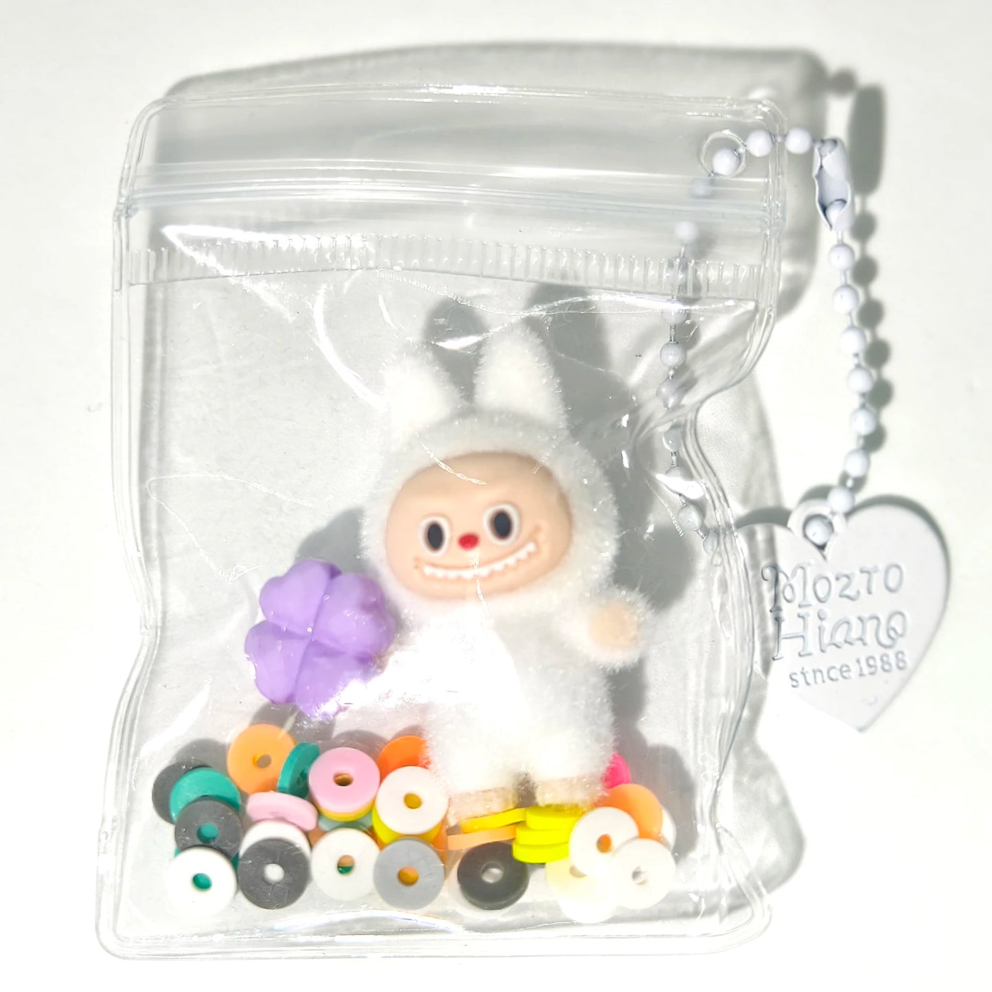 Kreativer transparenter Silikon Schlüsselanhänger mit Plüschmotiv