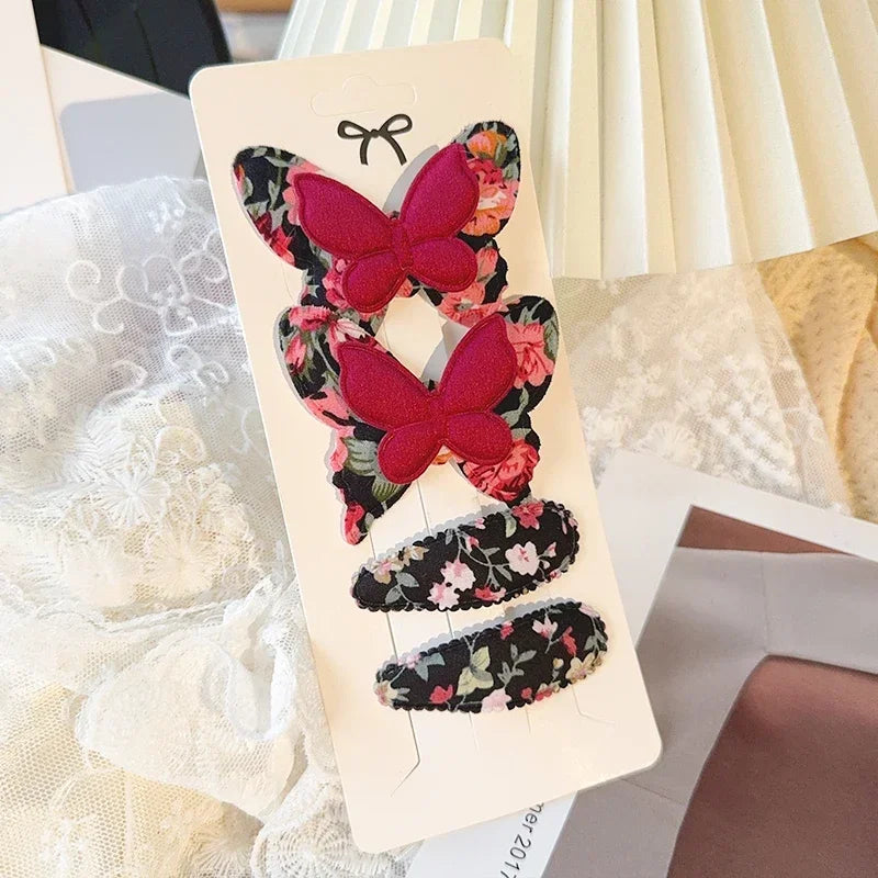 4-teiliges Haarschmuck Set für Mädchen mit Schmetterlingsdesign aus Polyester