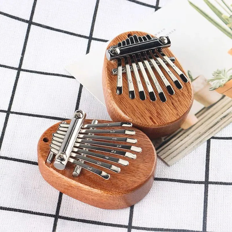 Tragbares Mini Daumenklavier aus Holz – 8 Töne, ideal für Anfänger - Reise