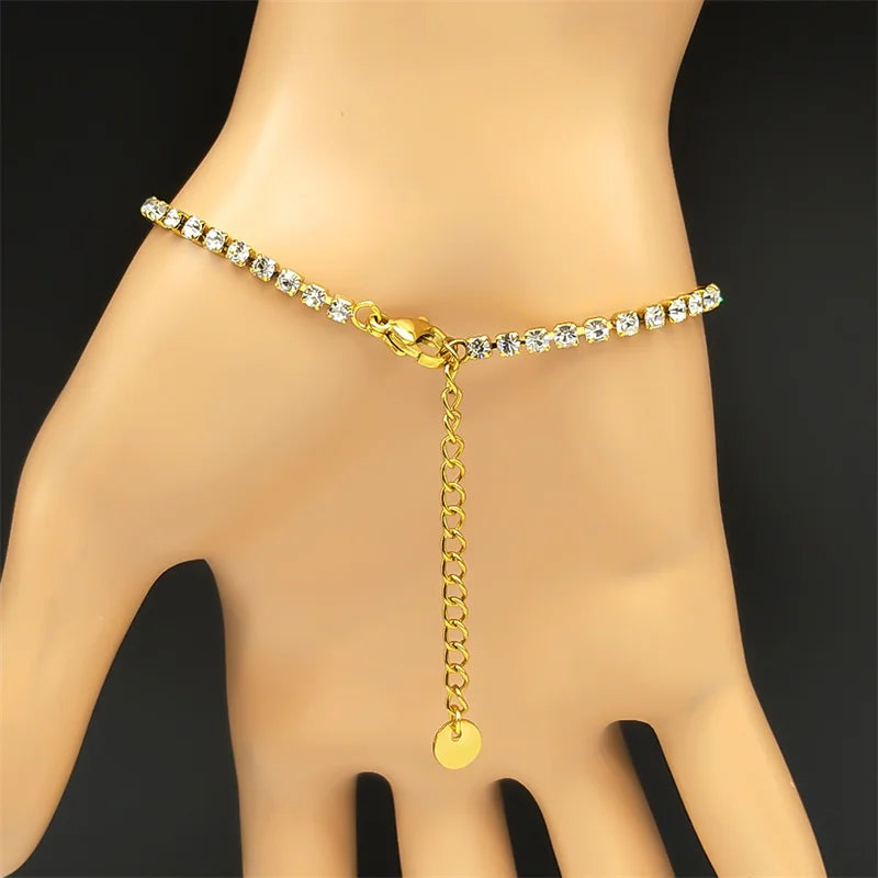 Goldfarbenes Edelstahl Armband mit blau grünem Auge und Strass für Damen