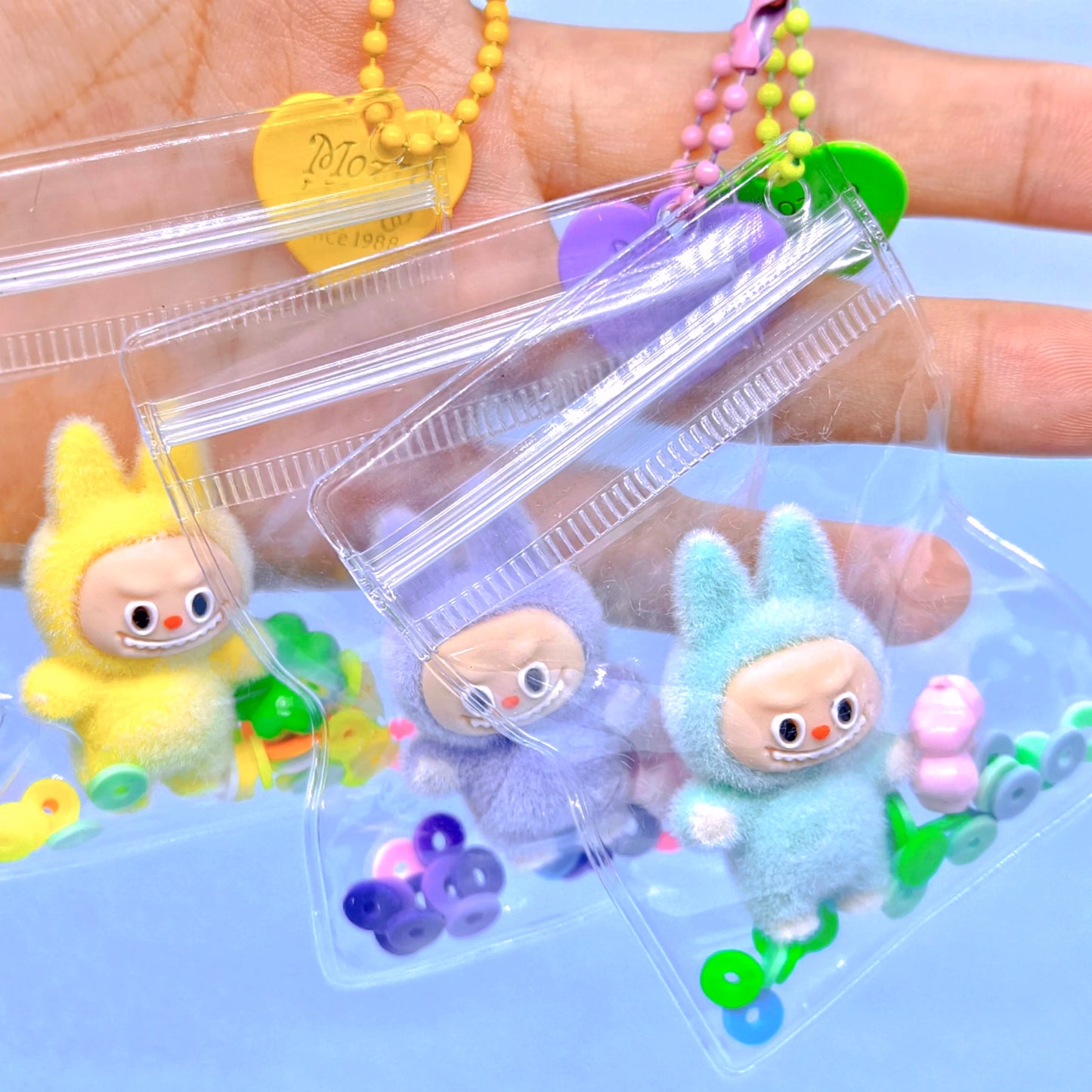 Kreativer transparenter Silikon Schlüsselanhänger mit Plüschmotiv