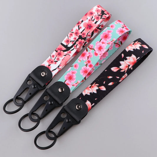 Stilvoller Schlüsselanhänger mit Kirschblüten Design und Lanyard