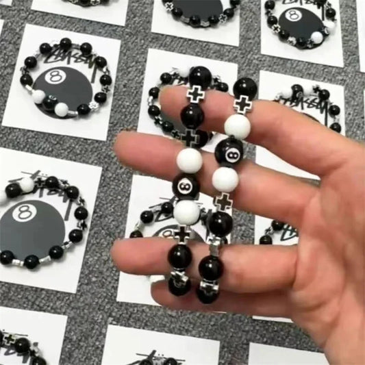 Elastisches Unisex Armband mit schwarzen Perlen Kugeln und Einstellbar