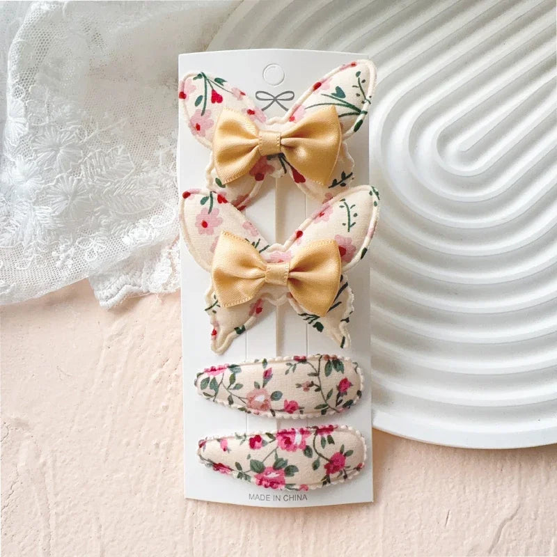 4-teiliges Haarschmuck Set für Mädchen mit Schmetterlingsdesign aus Polyester