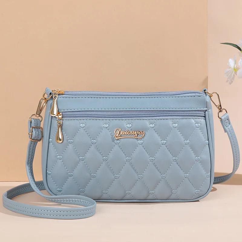 Elegante Damen Messenger Bag mit Stickerei - Haarball – weich, vielseitig - sicher Verschlossen