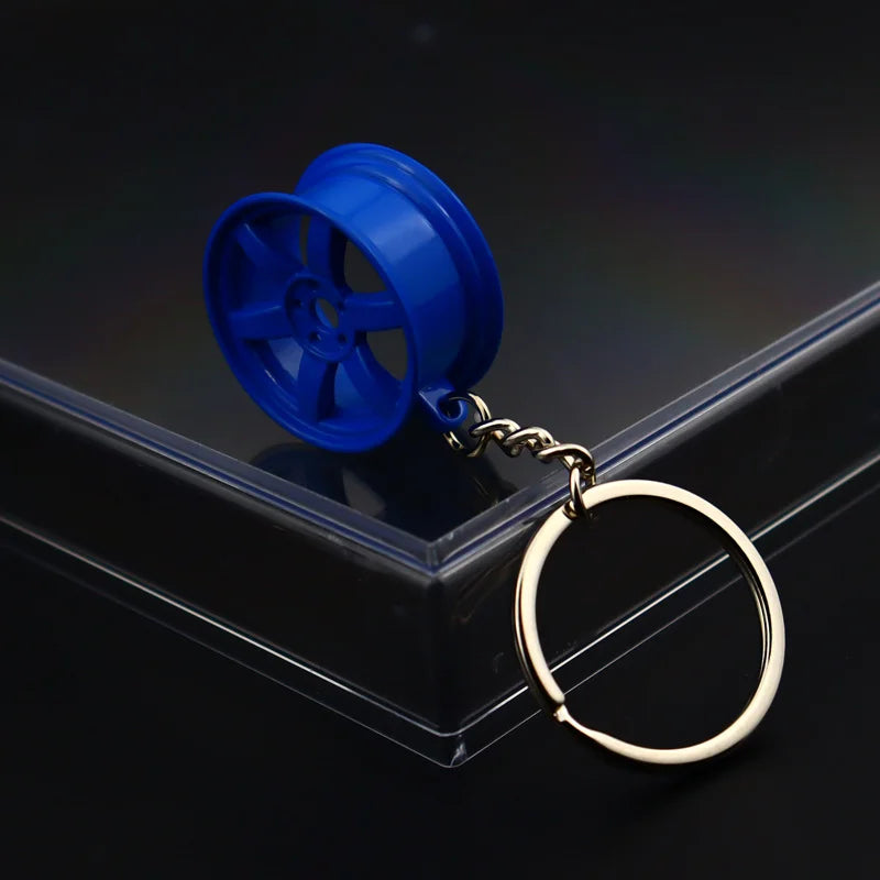 Robuster Edelstahl Schlüsselanhänger im Autoteile-Design – Perfektes Männergeschenk