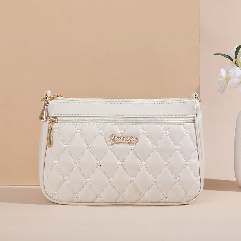 Elegante Damen Messenger Bag mit Stickerei - Haarball – weich, vielseitig - sicher Verschlossen