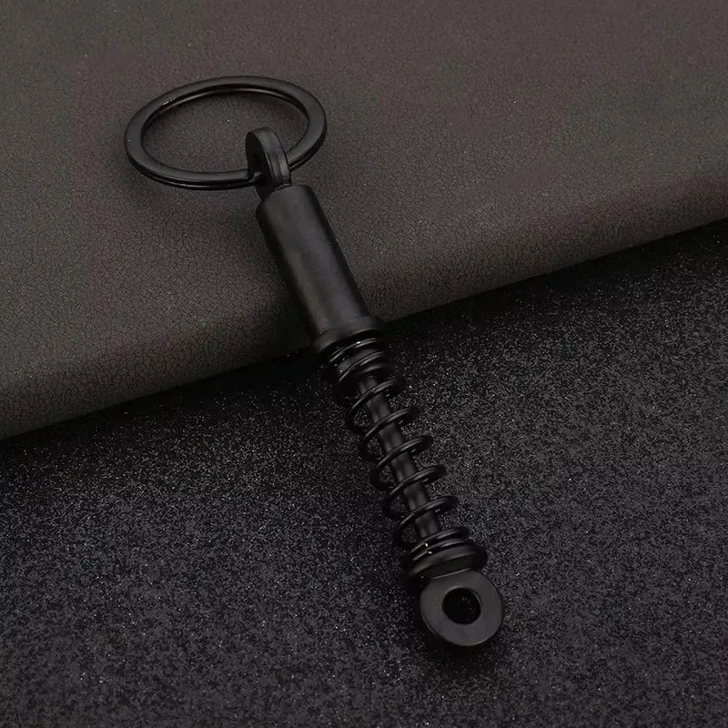 Robuster Edelstahl Schlüsselanhänger im Autoteile-Design – Perfektes Männergeschenk