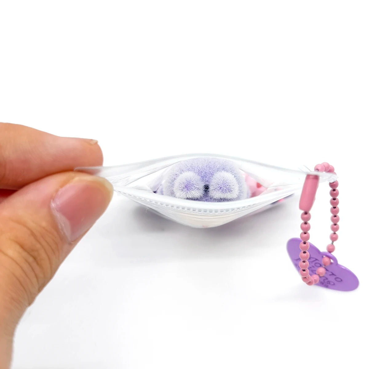 Kreativer transparenter Silikon Schlüsselanhänger mit Plüschmotiv