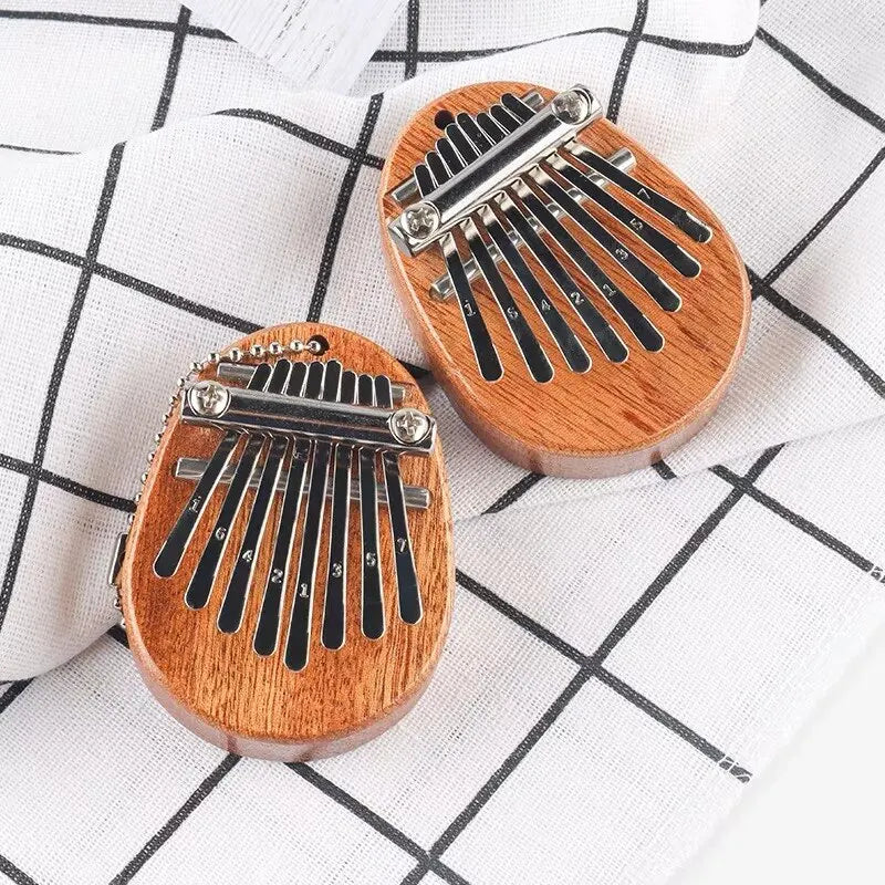 Tragbares Mini Daumenklavier aus Holz – 8 Töne, ideal für Anfänger - Reise