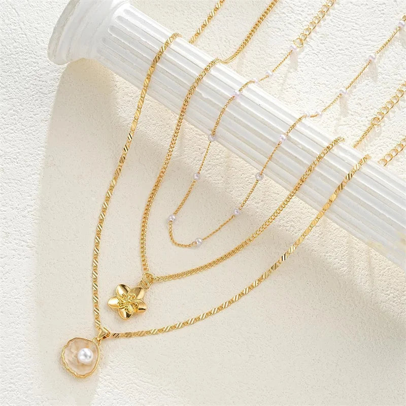 3tlg Goldfarbenes Boho Halsketten Set Muschelperlen Blumen Anhänger