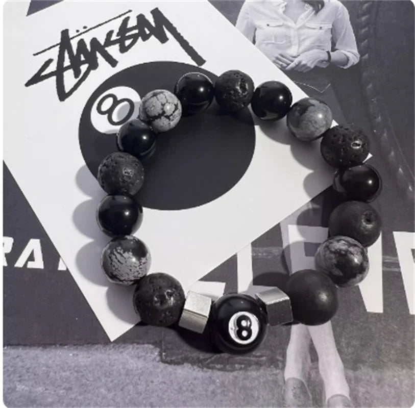 Elastisches Unisex Armband mit schwarzen Perlen Kugeln und Einstellbar