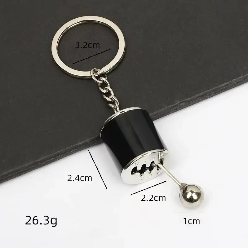 Robuster Edelstahl Schlüsselanhänger im Autoteile-Design – Perfektes Männergeschenk